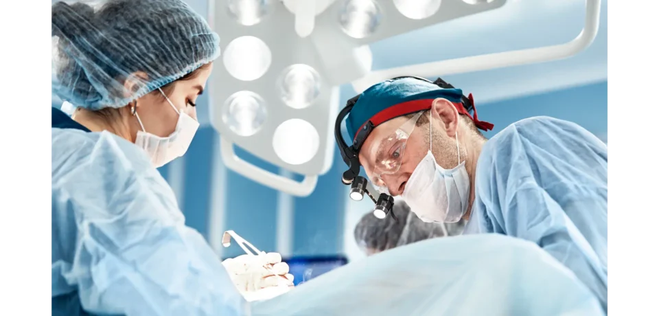 concentrated-surgical-team-operating-a-patient-in-physiozen
